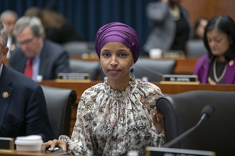 Rep. Ilhan Omar, D-Minn., sits with fellow Democrats on the House Education and Labor Committee during a bill markup, on Capitol Hill in Washington, Wednesday, March 6, 2019. (AP Photo/J. Scott Applewhite)

