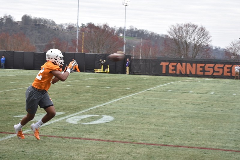 Tennessee freshman defensive back Jaylen McCollough hauls in a pass during Thursday's practice at Haslem Field.
