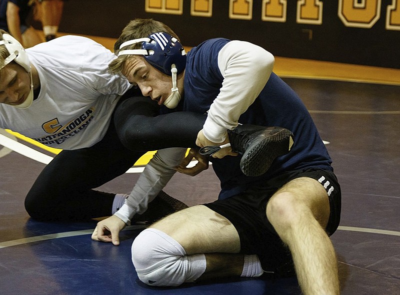 Staff file photo / UTC's Tanner Smith, right, was the SoCon's freshman wrestler of the year for 2019.