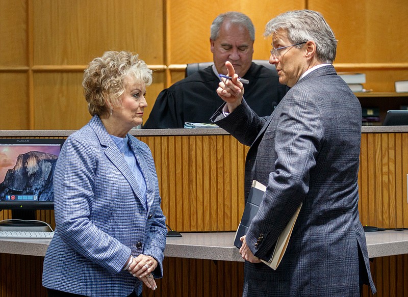 Chickamauga Schools Superintendent Melody Day, left, appears before Judge Gary Starnes with her attorney Lee Davis, right, in Hamilton County General Sessions Court at the Hamilton County-Chattanooga Courts Building on Friday, March 8, 2019, in Chattanooga, Tenn. Day pleaded no contest after being accused of swapping price tags on clothing at the Hamilton Place Mall Belk department store and agreed to pay $525.50 in restitution.
