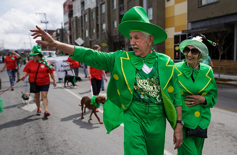 Bob Shankleton, left, and Mairead McManmanom march in the 2018 St. Chatty's Day Parade. This year's parade to celebrating St. Patrick's Day will be Saturday.