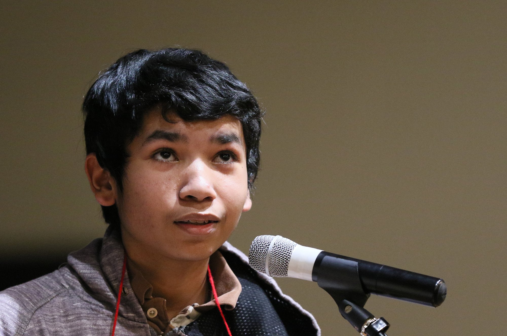 Jeff Avila of Dalton Middle School thinks as he spells a word during the 2019 Times Free Press Regional Spelling Bee Saturday, March 9, 2019 at the University of Tennessee at Chattanooga University Center.