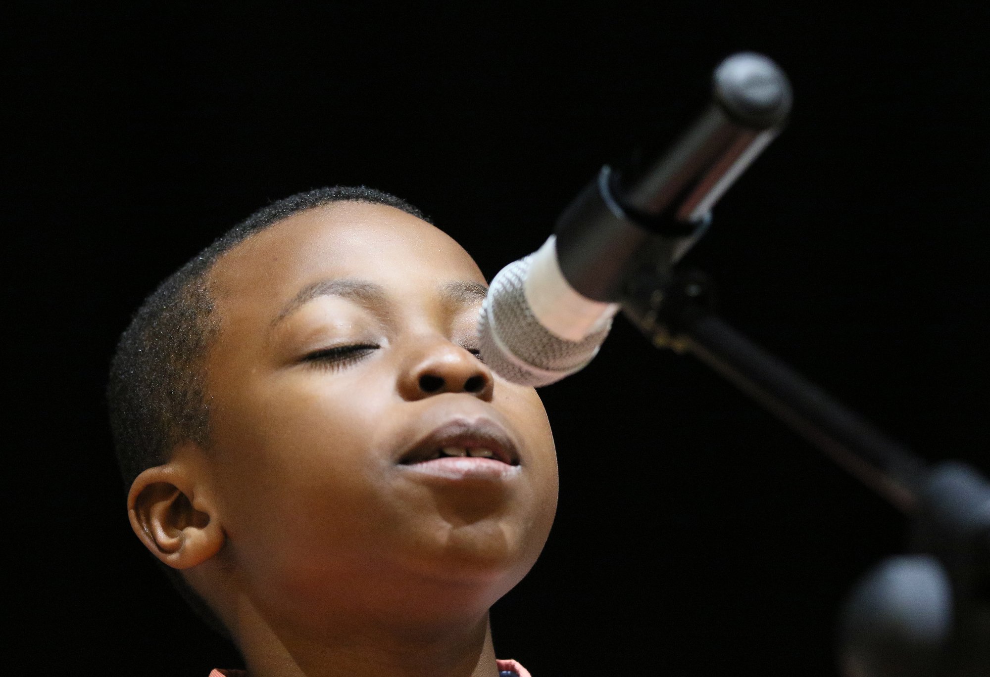 Olutomiwa Ilesanmi from Wallace A. Smith Elementary School closes his eyes as he spells a word during the 2019 Times Free Press Regional Spelling Bee Saturday, March 9, 2019 at the University of Tennessee at Chattanooga University Center.