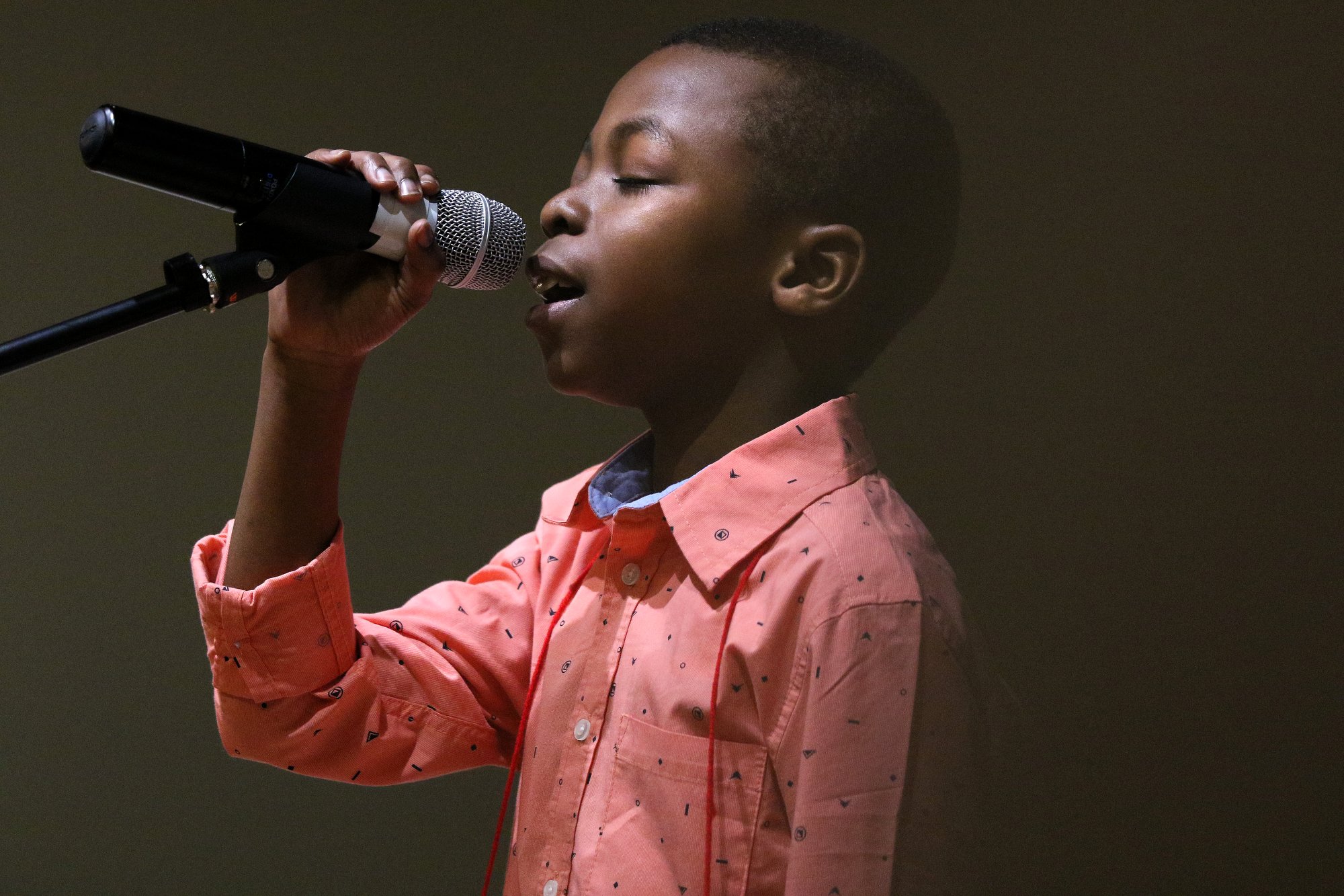 Olutomiwa Ilesanmi from Wallace A. Smith Elementary School closes his eyes as he spells a word during the 2019 Times Free Press Regional Spelling Bee Saturday, March 9, 2019 at the University of Tennessee at Chattanooga University Center.