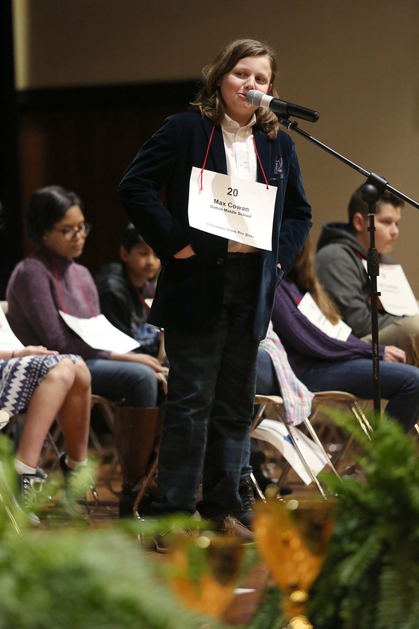 Max Cowan of Dalton Middle School asks for the definition of a word during the 2019 Times Free Press Regional Spelling Bee Saturday, March 9, 2019 at the University of Tennessee at Chattanooga University Center.