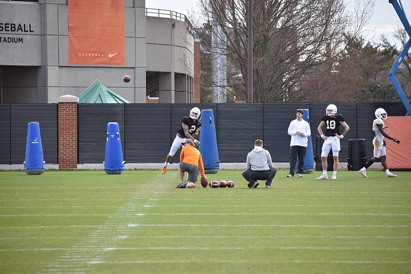 Tennessee quarterback Jarrett Guarantano throws a pass during practice on Monday, March 11, 2019, at Haslem Field. 
