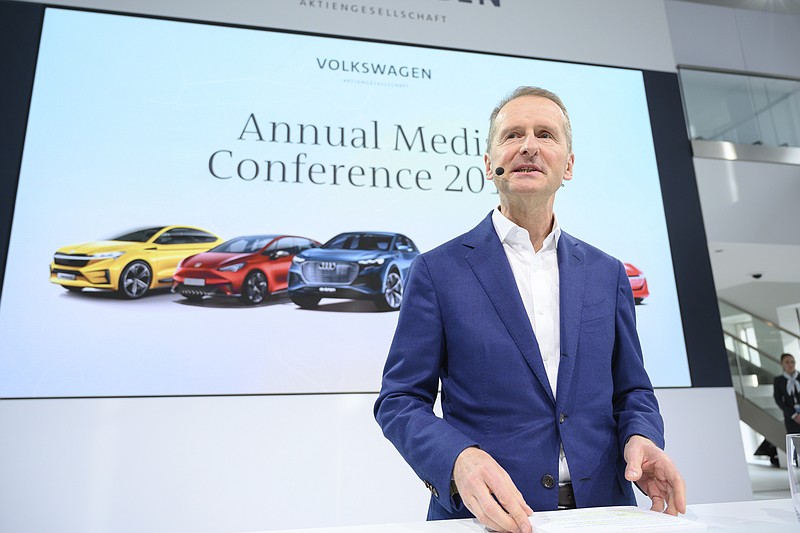 Herbert Diess, CEO of the Volkswagen AG, addresses the media during the annual press conference of the car manufacturer Volkswagen AG in Wolfsburg, Germany, Tuesday, March 12, 2019. (Christophe Gateau/dpa via AP)