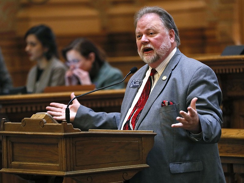 Senate Rules Chairman Jeff Mullis takes to the well to defend the committee assignments Wednesday, Jan. 16, 2019 in Atlanta. Female senators on both sides of the aisle blasted what they're calling sexism in committee assignments after Sen. Renee Unterman was moved from her powerful position as the chairwoman of the health committee to the lower-profile science and technology. Lt. Gov. Geoff Duncan touted the fact that four committees are chaired by women this year. Two women chaired committees last year. Unterman, and Democrats, are arguing that the move is cosmetic, since those committees see very few bills. (Bob Andres/Atlanta Journal-Constitution via AP)