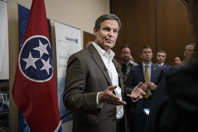 FILE - In this Feb. 1, 2019 file photo, Tennessee Gov. Bill Lee answers questions from the media during a visit to Gestamp Inc., in Chattanooga, Tenn. Lee will present his first budget and outline his legislative agenda to state lawmakers during his upcoming State of the State address. The new Republican governor will speak before the GOP-dominated Tennessee General Assembly on Monday, March 4.  (Doug Strickland/Chattanooga Times Free Press via AP, File)