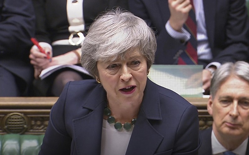Britain's Prime Minister Theresa May speaks during Prime Minister's Questions inside the House of Commons in London, Wednesday March 13, 2019. Britain and the European Union seem braced Wednesday for a chaotic, cliff-edge Brexit, as Britain's Parliament is set to hold further votes over the split with European Union. (House of Commons/PA via AP)
