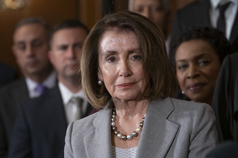 Speaker of the House Nancy Pelosi, D-California, is setting a high bar for impeachment of President Donald Trump, saying he is "just not worth it." (AP Photo/J. Scott Applewhite)