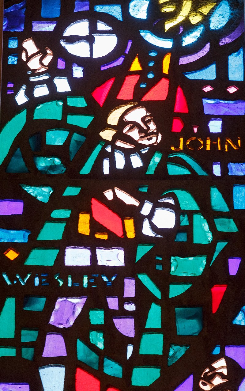 A stained-glass window depicting Methodism founder John Wesley is seen at First-Centenary United Methodist Church on Friday, Feb. 22, 2019, in Chattanooga, Tenn. A special session of the United Methodists General Conference begins Saturday in St. Louis, Mo., where delegates are expected to hear discussion on homosexuality in the Methodist church.
