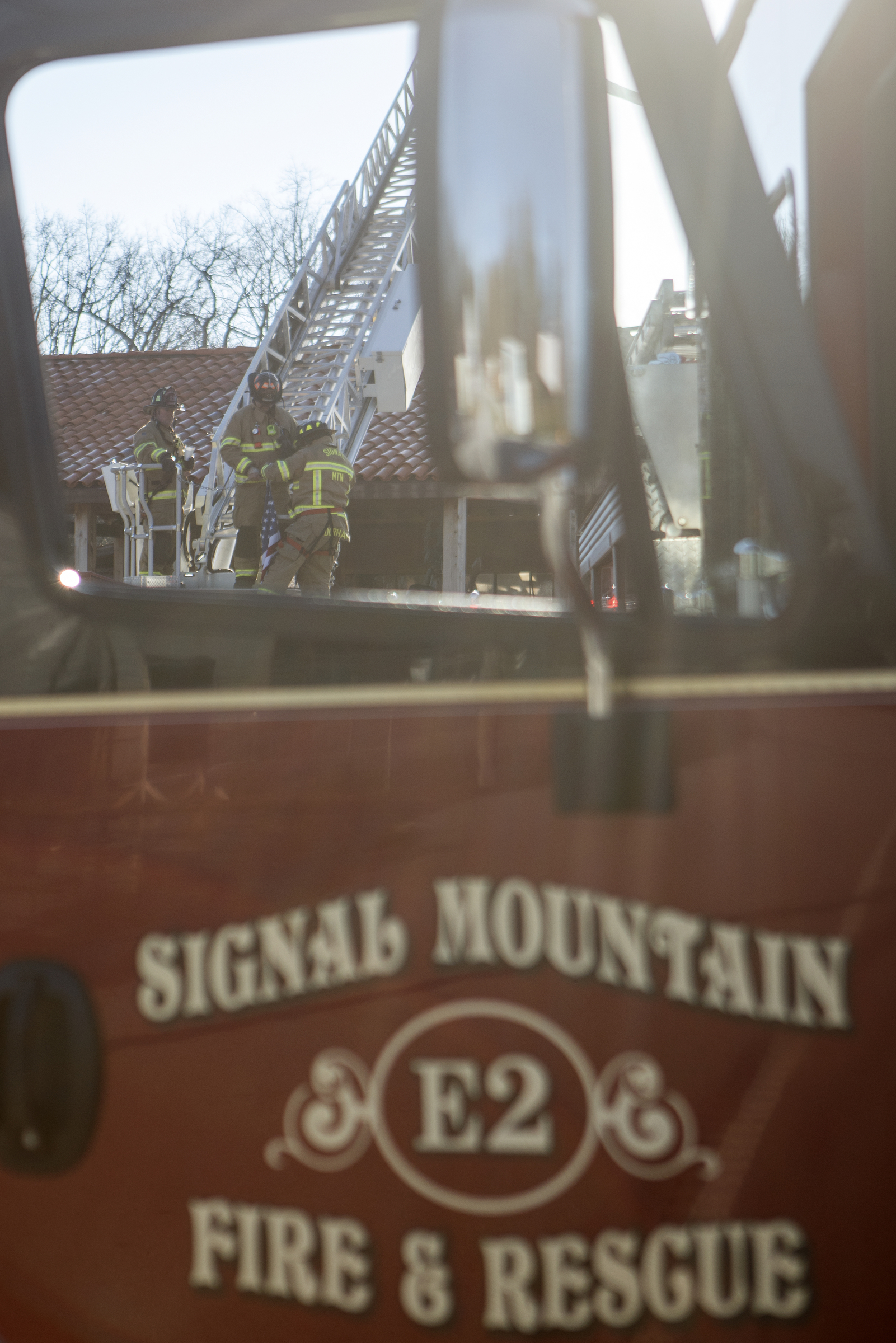 Firefighters work on a ladder truck at Patron Mexican Grill located at 3720 Taft Highway on Monday, March 18, 2019 in Signal Mountain, Tenn.