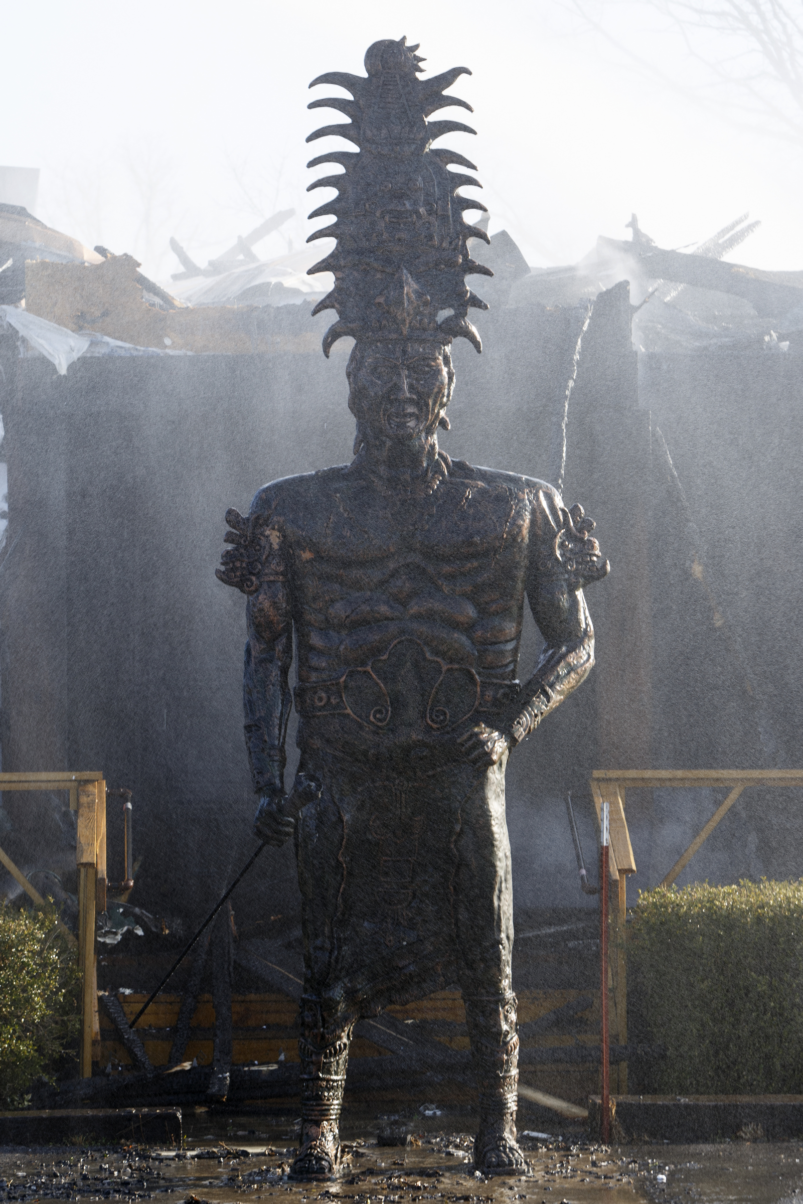 Mist from fire hoses falls over a statue outside of Patron Mexican Grill, located at 3720 Taft Highway, on Monday, March 18, 2019 in Signal Mountain, Tenn.