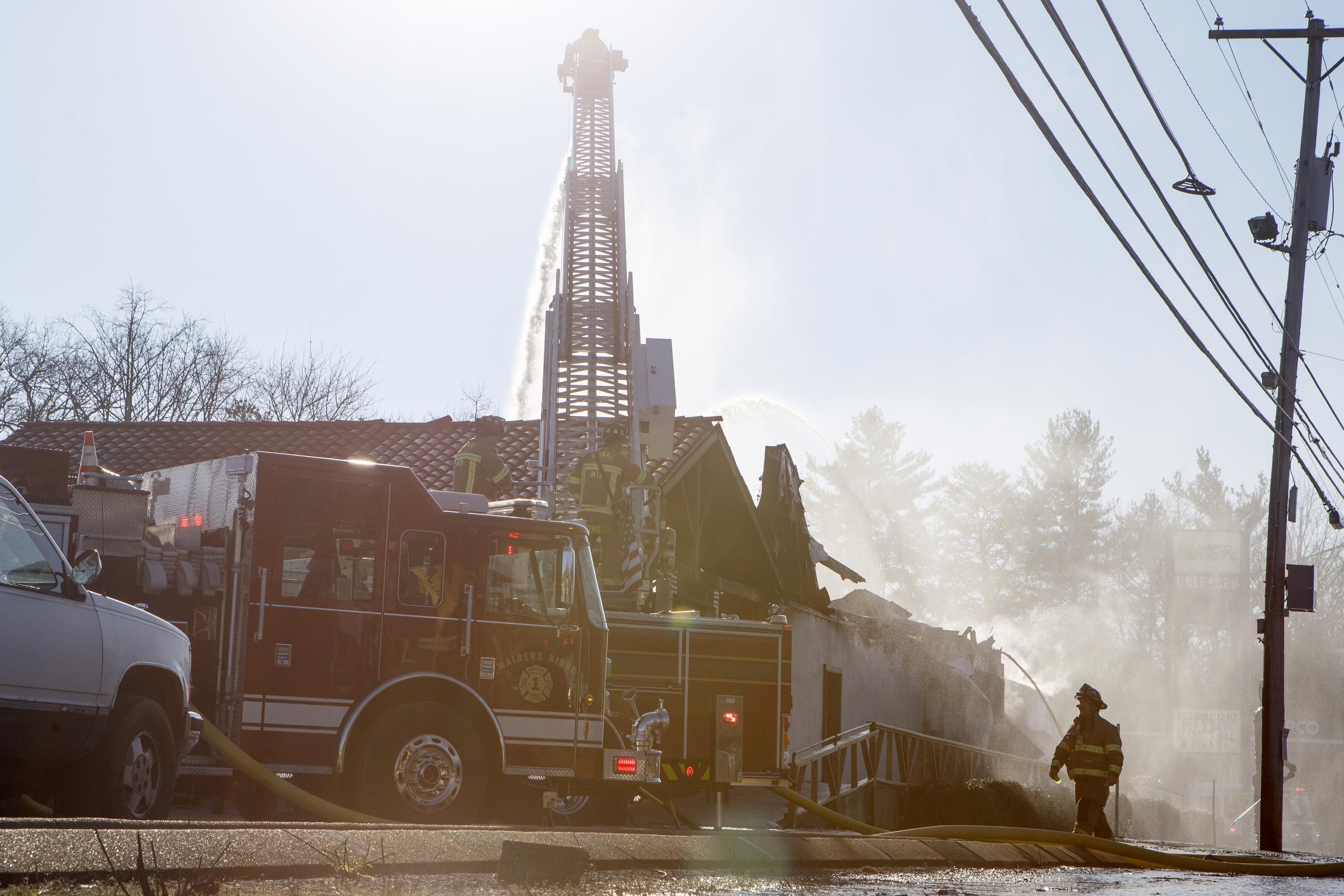 Firefighters work to put out a fire at Patron Mexican Grill located at 3720 Taft Highway on Monday, March 18, 2019 in Signal Mountain, Tenn.