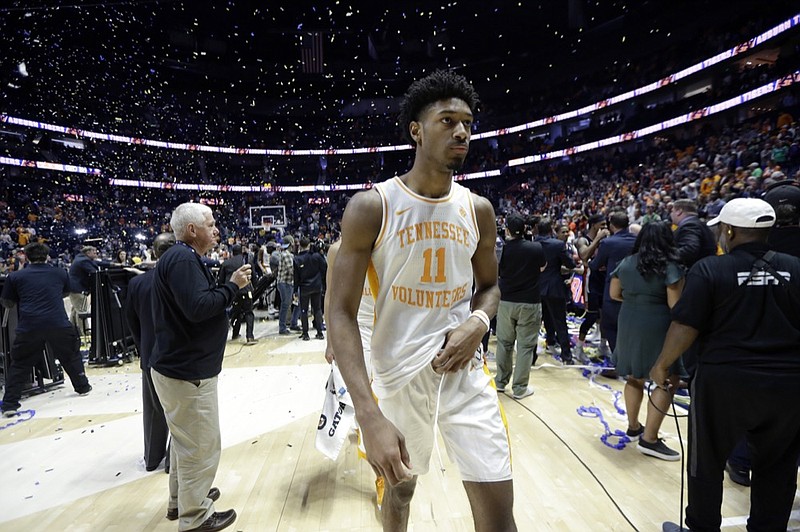 Tennessee's Kyle Alexander walks off the court after the Vols lost to Auburn in the SEC tournament title game Sunday in Nashville. Auburn won 84-64.