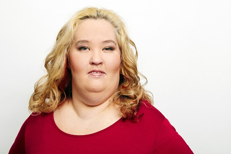 FILE - In this Dec. 3, 2015 file photo, June Shannon, better known as Mama June, poses for a portrait in New York. Shannon has been arrested on drug charges in Alabama. News outlets report that Shannon and a friend, Eugene Doak, were arrested March 13 at a gas station in Macon County where he was heard threatening her. The reports say that in the course of the investigation authorities found drugs and drug paraphernalia. The 39-year-old Shannon is the mother of Alana "Honey Boo Boo" Thompson, who starred in a reality TV show on TLC. (Photo by Dan Hallman/Invision/AP, File)

