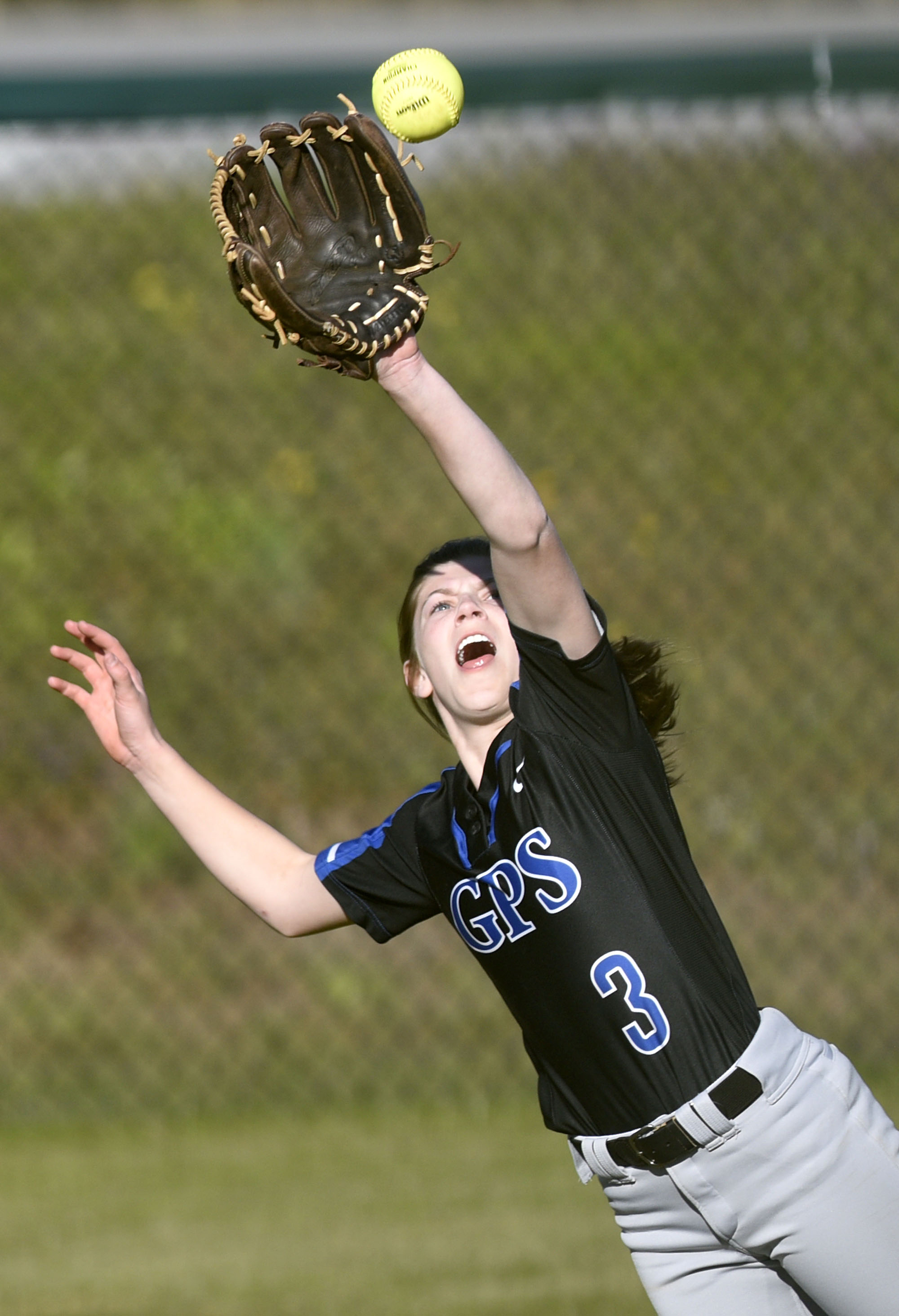 GPS left fielder Stella Henry makes a jumping catch on a Silverdale Baptist Academy line drive during the visiting Bruisers' 18-4 win Tuesday at Silverdale.
