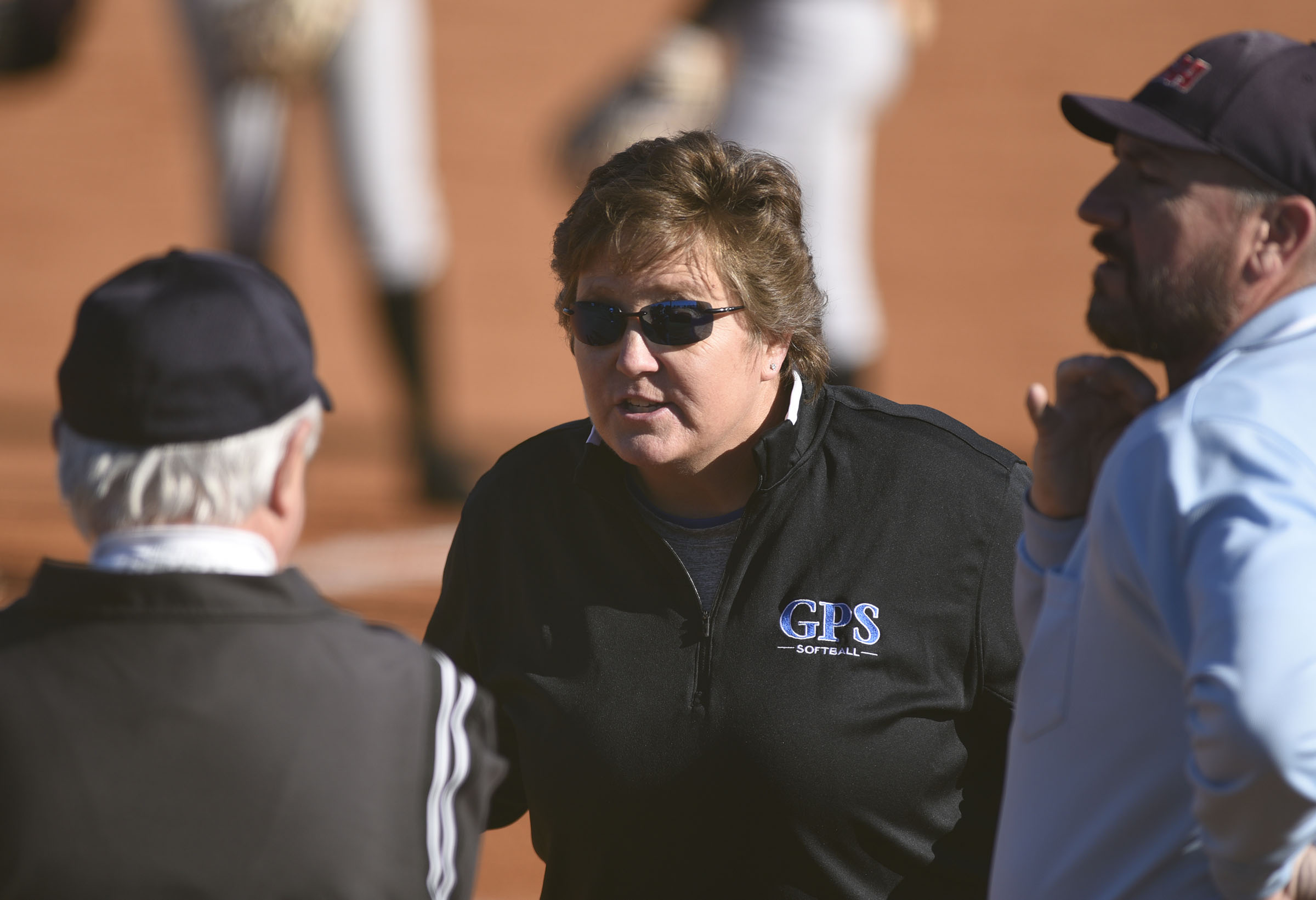 GPS head coach Susan Crownover has a discussion with the umpires over a infield fly ruling. The Silverdale Baptist Academy Lady Seahawks hosted the Girls Preparatory School Bruisers in TSSAA softball action on March 19, 2019.