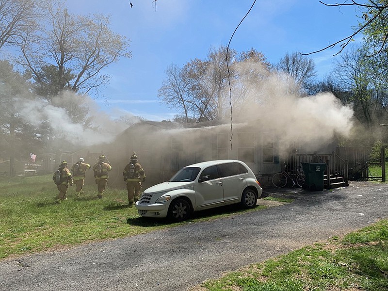 Chattanooga firefighters work the scene of a trailer home fire on the 2600 block of Boyce Street on Tuesday, March 19, 2019.