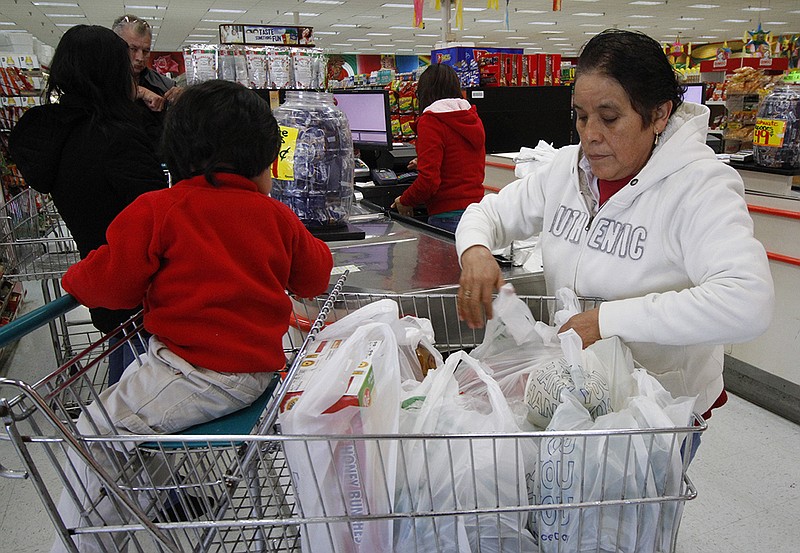 kids paying for groceries