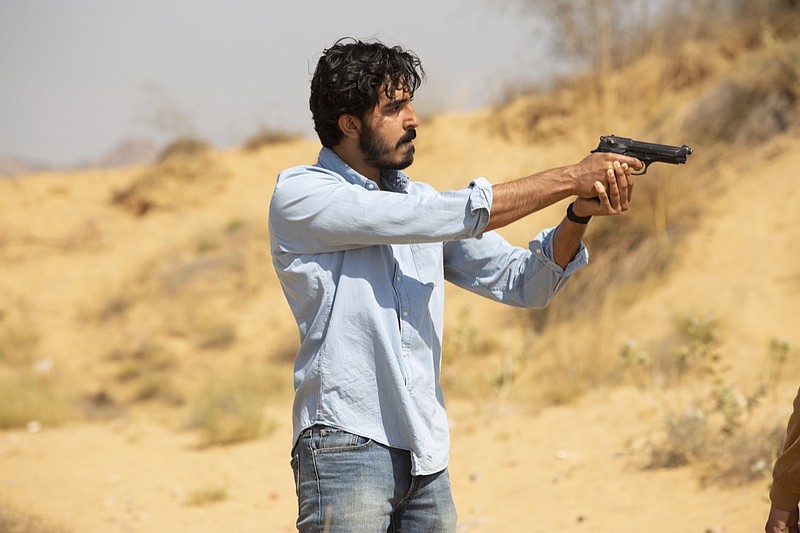 This image released by IFC Films shows Dev Patel in a scene from "The Wedding Guest." (Ganesh Patil/IFC Films via AP)