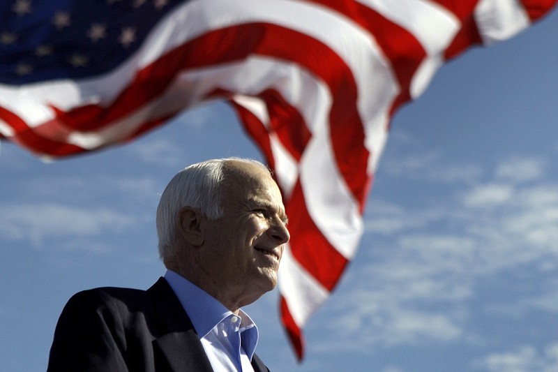 In this Nov. 3, 2008, file photo, Republican presidential candidate Sen. John McCain, R-Ariz. speaks at a rally outside Raymond James Stadium in Tampa, Fla. (AP Photo/Carolyn Kaster)