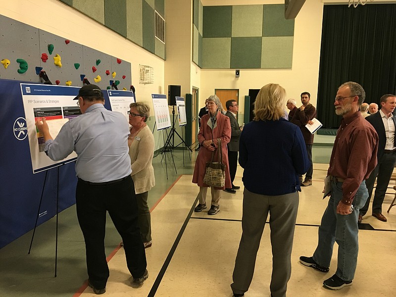 TVA power planners discuss integrated resource plan options with residents during a Chattanooga hearing Wednesday night. / Photo by Dave Flessner