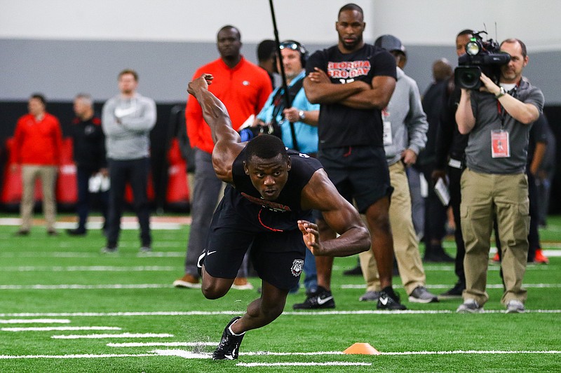 Former Georgia cornerback Deandre Baker participates in a drill Wednesday morning during the Bulldogs' pro day in Athens.