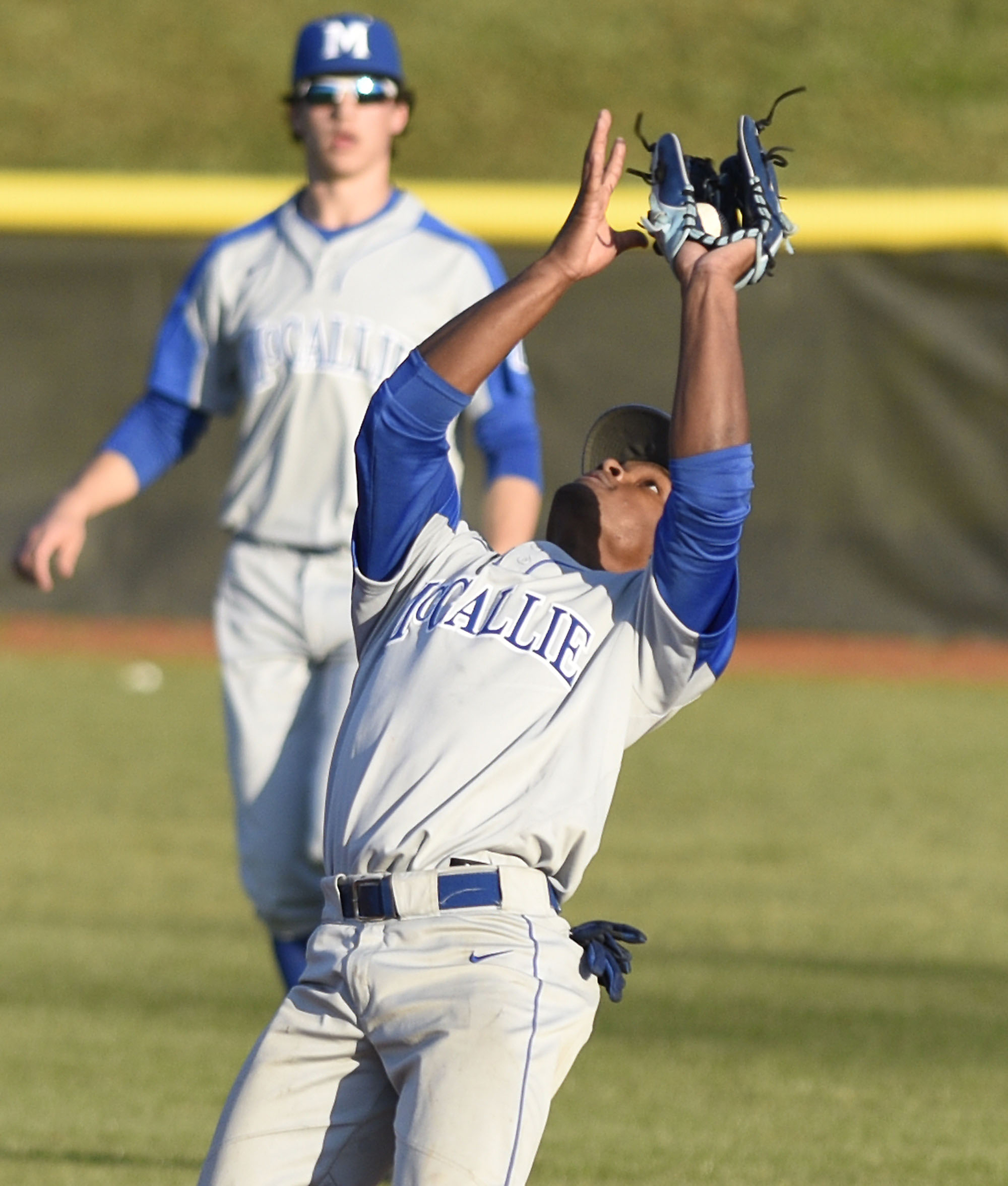 McCallie shortstop Daalen Adderley (12) cathces a Baylor pop fly. The Baylor Red Raiders visited the McCallie Blue Tornado in TSSAA baseball action on March 20, 2019.