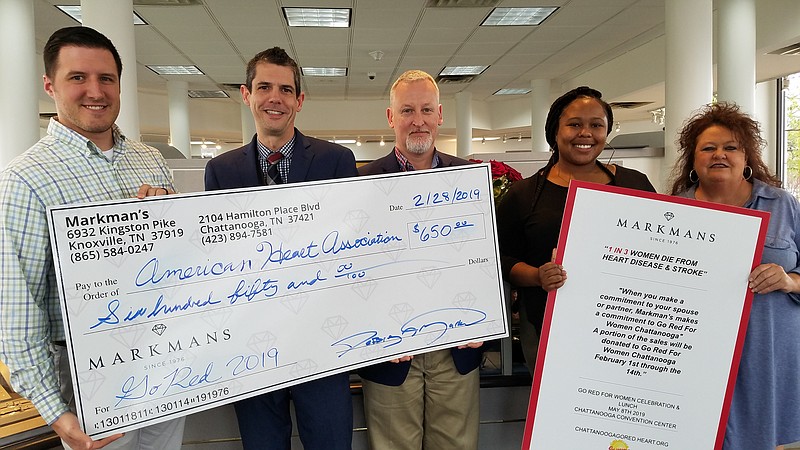 Markman's donated a portion of the proceeds from a recent jewelry sale to the Chattanooga chapter of Go Red for Women. Participants are, from left, Jake Johnson, Scott Burnett, Jerry Funk, Takesha Corn and Derenda Brown