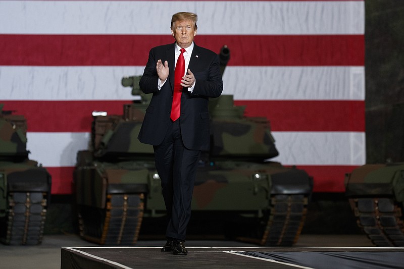 President Donald Trump arrives to deliver remarks at the Lima Army Tank Plant last week in Lima, Ohio. (AP Photo/Evan Vucci)