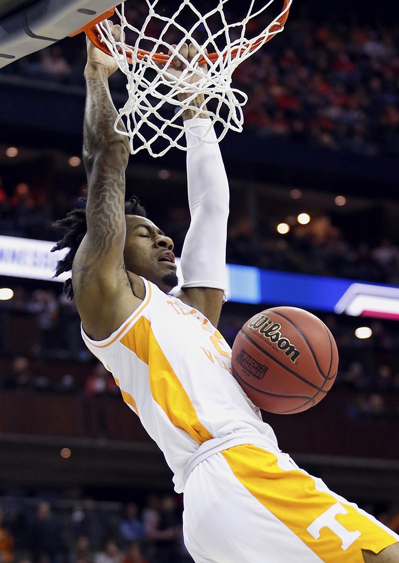 Tennessee's Jordan Bowden dunks during the Vols' NCAA tournament opener against Colgate on Friday afternoon in Columbus, Ohio.