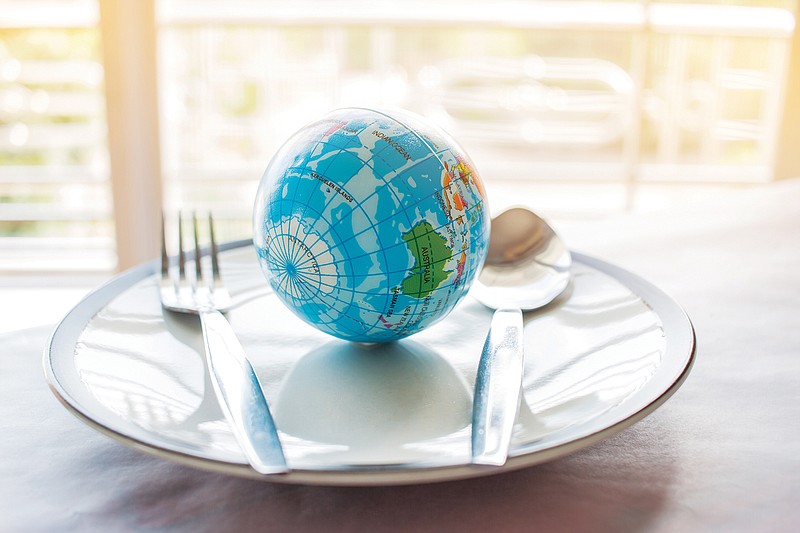 The world on a plate / Getty Images/iStockphoto/smolaw11