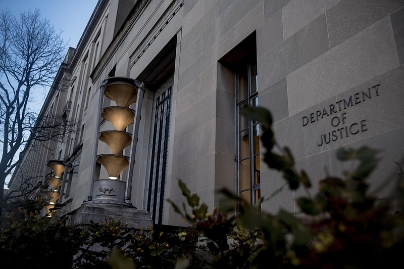 The Department of Justice in Washington, Friday, March 22, 2019, as Special counsel Robert Mueller has concluded his investigation into Russian election interference and possible coordination with associates of President Donald Trump. The Justice Department says Mueller delivered his final report Friday to Attorney General William Barr, who is reviewing it. (AP Photo/Andrew Harnik)

