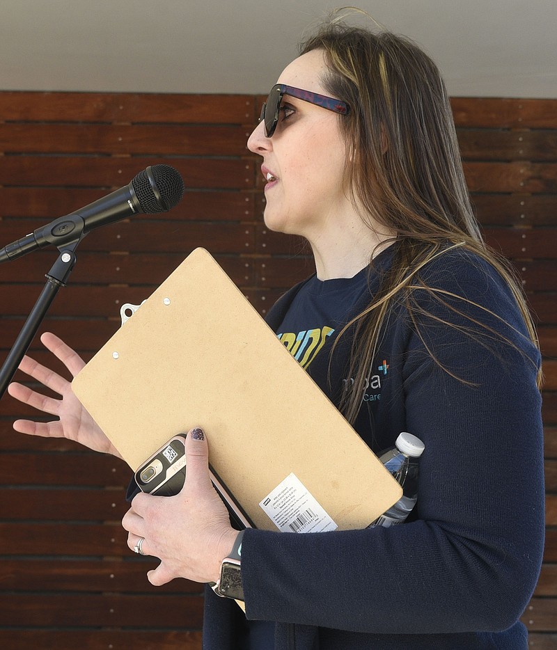 Cempa DEO Shannon Stevenson readies the crowd for the march.  Cempa Community Care's 24th Annual Strides of March was held at Renaissance Park on March 23, 2019.  A memorial walk was held to remember those lost to HIV/AIDS.  