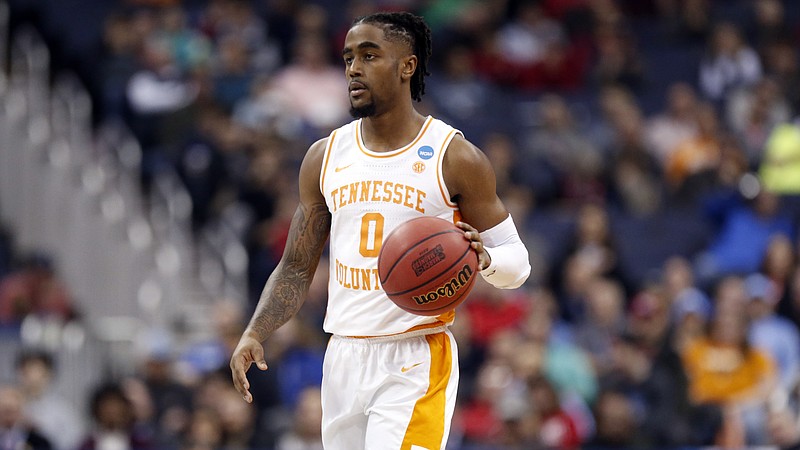 Tennessee's Jordan Bone takes the ball up the floor during an NCAA tournament first-round game against Colgate on March 22 in Columbus, Ohio.