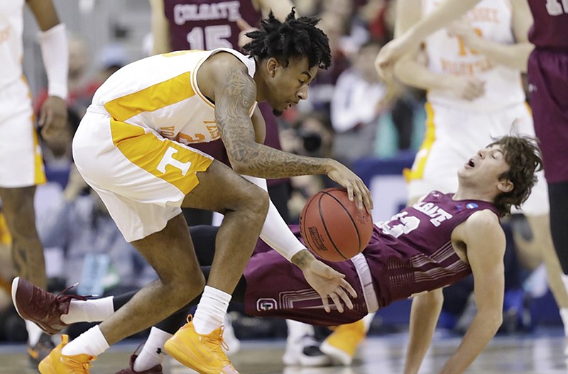 Tennessee's Jordan Bowden drives past Colgate's Jack Ferguson during their NCAA tournament game Friday in Columbus, Ohio.