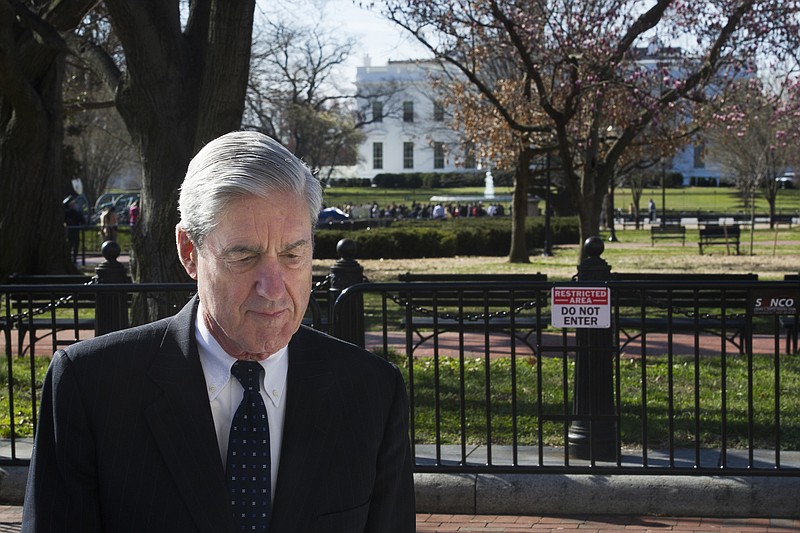 Special Counsel Robert Mueller walks past the White House after attending services at St. John's Episcopal Church, in Washington, D.C., on Sunday.