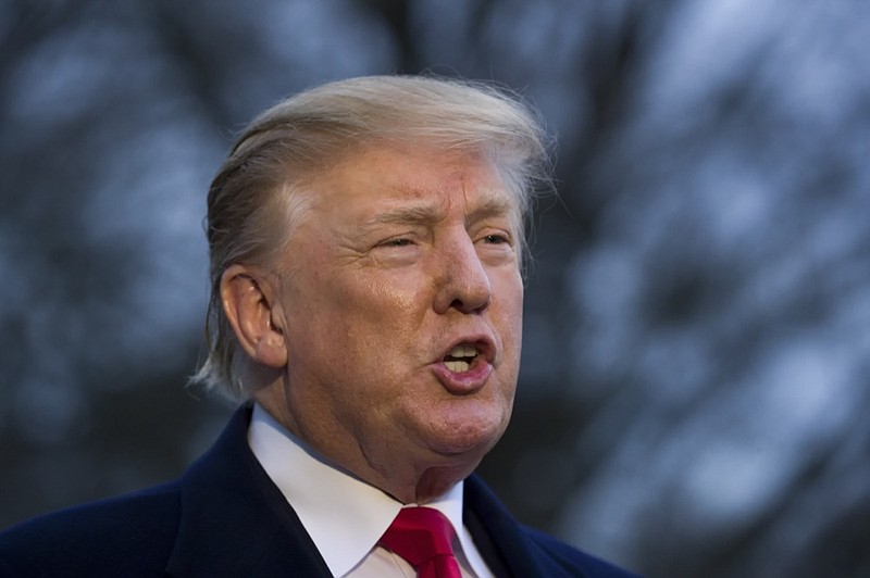 President Donald Trump speaks with the media after stepping off Marine One on the South Lawn of the White House, Sunday, March 24, 2019, in Washington. The Justice Department said Sunday that special counsel Robert Mueller's investigation did not find evidence that President Donald Trump's campaign "conspired or coordinated" with Russia to influence the 2016 presidential election. (AP Photo/Alex Brandon)

