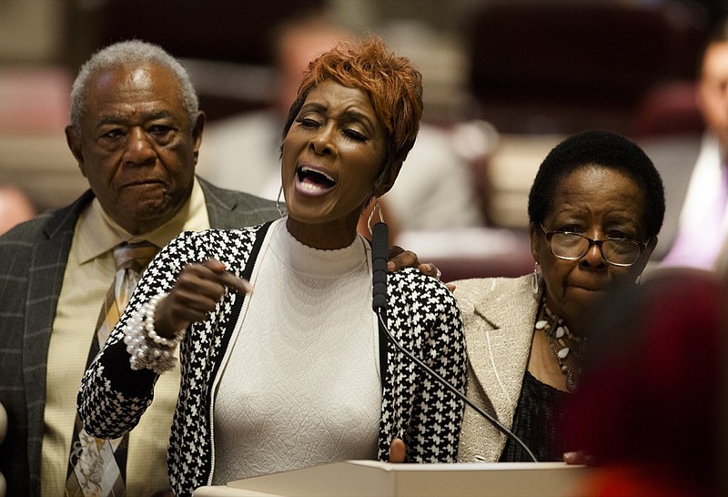 File-This May 18, 2017, file photo shows Rep. Juandalynn Givan, D-Birmingham, addressing the House of Representatives at the Alabama State House building in Montgomery, Ala. Givan apologized for an outburst on the floor of the Alabama House of Representatives in which she repeatedly shouted at the House speaker.
 She issued a statement over the weekend to "humbly express my apologies to my colleagues." The Birmingham Democrat said she also wanted to challenge fellow lawmakers "to avoid actions that encourage division and oppression." (Albert Cesare/The Montgomery Advertiser via AP, File)

