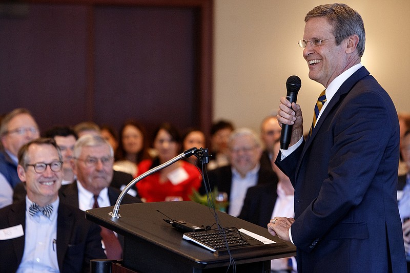 Staff photo by C.B. Schmelter / Gov. Bill Lee smiles as he talks about his school voucher plan at the Chattanooga Area Chamber of Commerce on Friday.