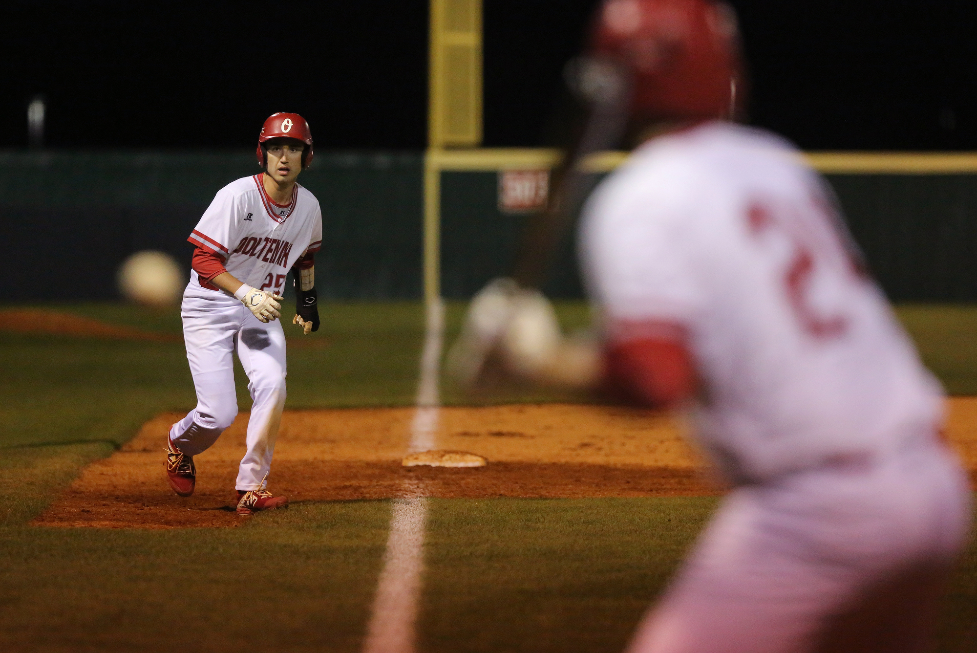 Ooltewah's Steven McHone (25) gets a lead off third Tuesday, March 26, 2019 during the East Hamilton vs. Ooltewah baseball game at Ooltewah High School in Ooltewah, Tennessee.