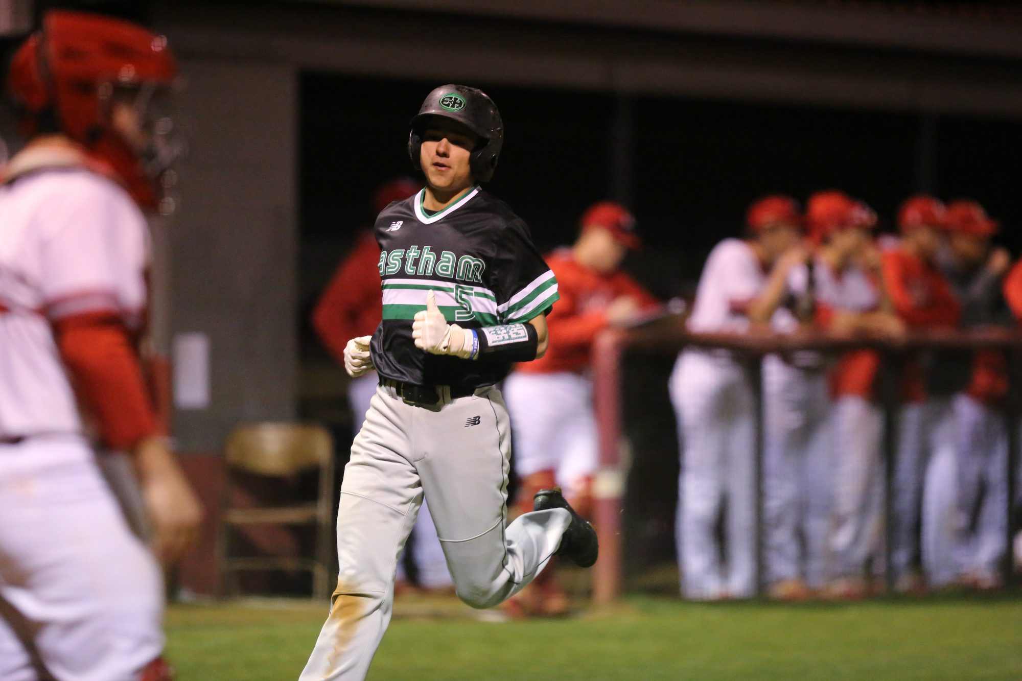 East Hamilton's Jackson Stone (5) scores Tuesday, March 26, 2019 during the East Hamilton vs. Ooltewah baseball game at Ooltewah High School in Ooltewah, Tennessee.