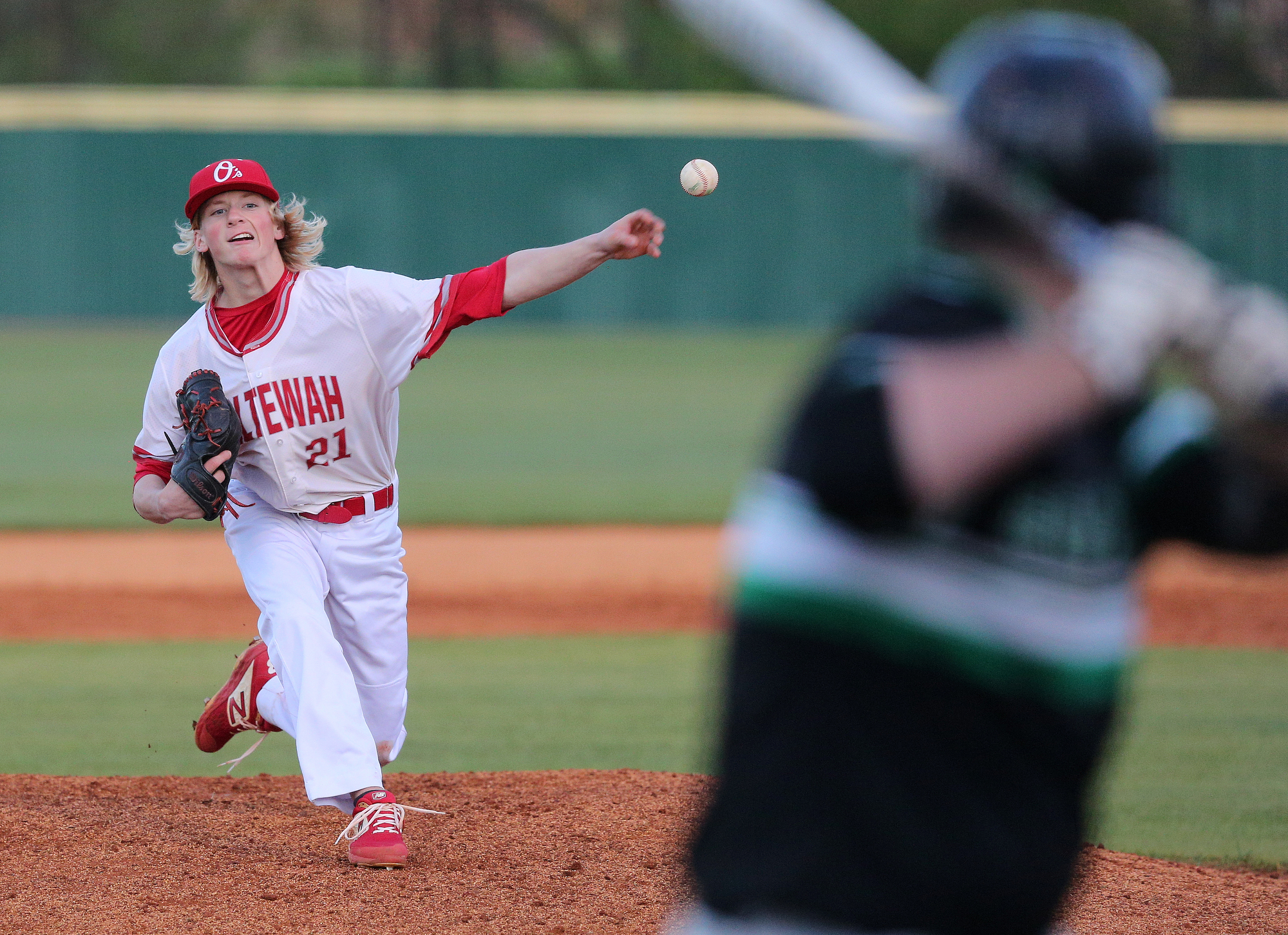 Ooltewah's Chris Bayne (21) pitches Tuesday, March 26, 2019 during the East Hamilton vs. Ooltewah baseball game at Ooltewah High School in Ooltewah, Tennessee.