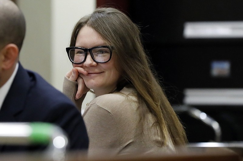 Anna Sorokin sits at the defense table in New York State Supreme Court, in New York, Wednesday, March 27, 2019. She is on trial on grand larceny and theft of services charges. (AP Photo/Richard Drew)

