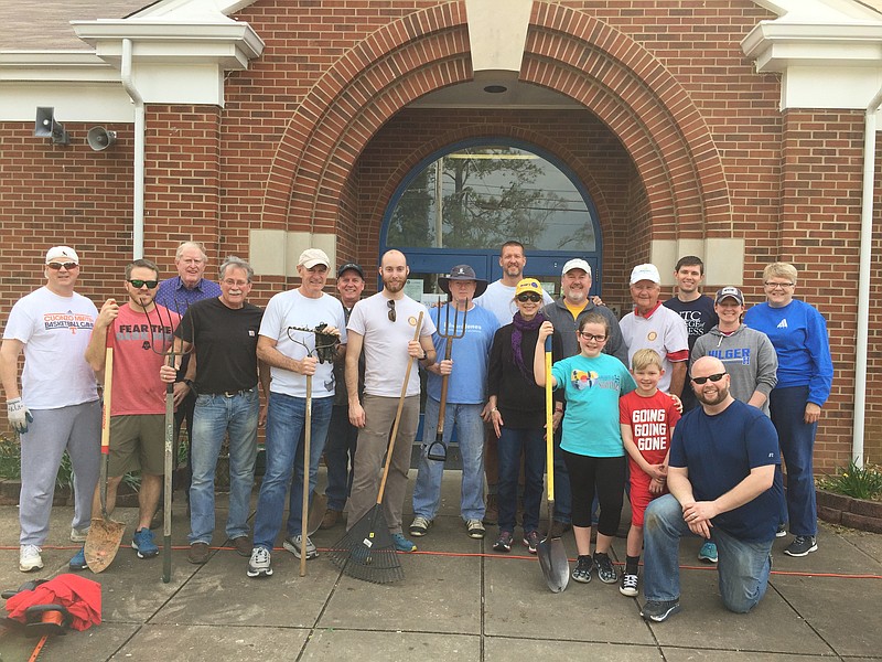 Rotary Club of Chattanooga Hamilton Place club members along with some family members in front of Bess T. Shepherd Elementary School.