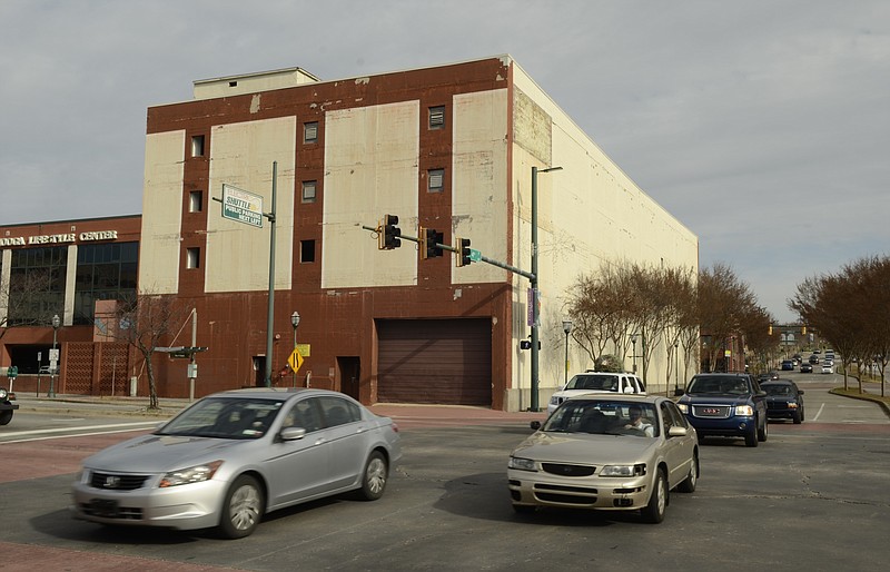 Staff file photo / The John Ross Building sits on the corner of Fourth and Market streets and stretches to Broad near the riverfront downtown.