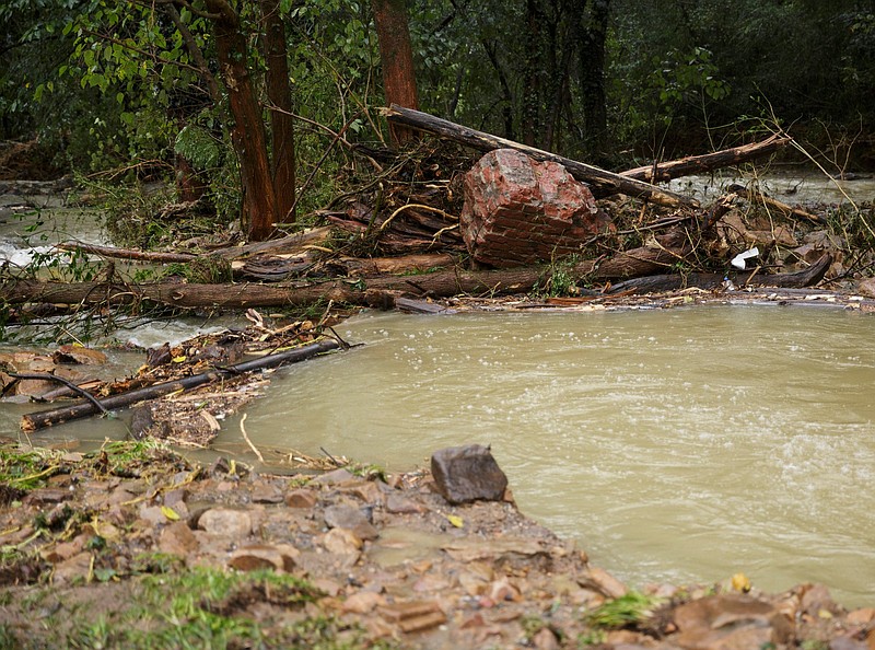 Little Soddy Creek is choked with debris one day after a deadly flash flood in the Depot Street area on Sept. 27, 2018. Soddy-Daisy recently received a grant to stabilize portions of the creek bed along Depot Street and at the end of Durham Street.