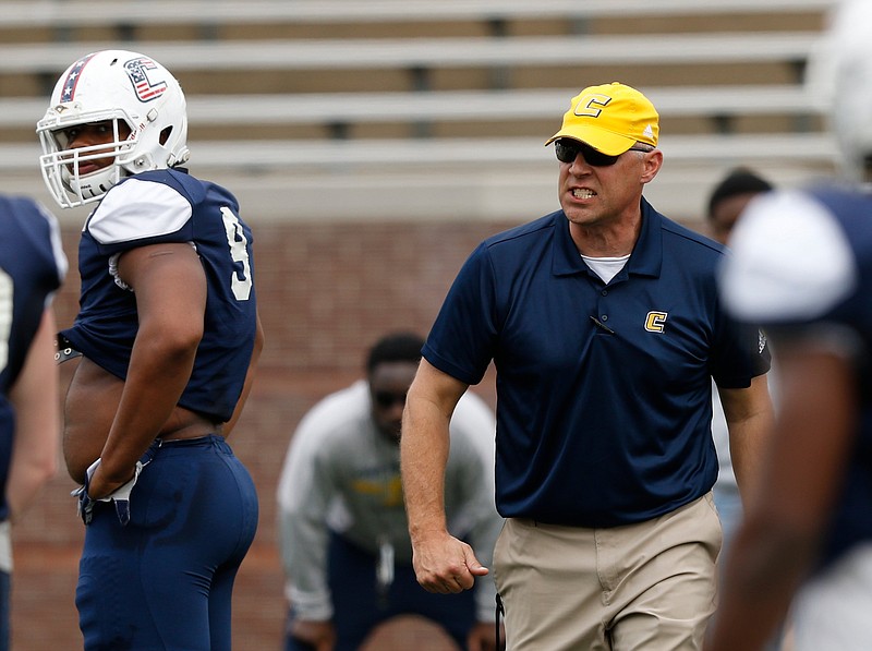 Chattanooga head football coach Rusty Wright shouts at players during the University of Tennessee at Chattanooga spring football scrimmage at Finley Stadium on Saturday, March 30, 2019, in Chattanooga, Tenn. 